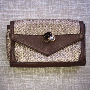 Juicy Couture charm gold metallic brushed clutch. Hot pink inside